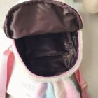 Open Rabbit Ears Plush Backpack showing interior details and straps.