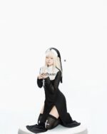 Anime Nun Costume - Halloween Edition model wearing a black nun outfit and cross. A detailed cosplay.