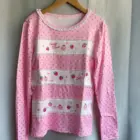 Mezzo Piano Shirt featuring a pink polka dot design with strawberry and heart motifs.