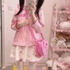 Heart Shaped Cross Body Bag - Jojifuku Aesthetic worn by a person.