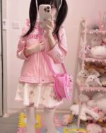 Heart Shaped Cross Body Bag - Jojifuku Aesthetic worn by a person.