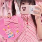 Heart Shaped Cross Body Bag - Jojifuku Aesthetic, pink with character design.