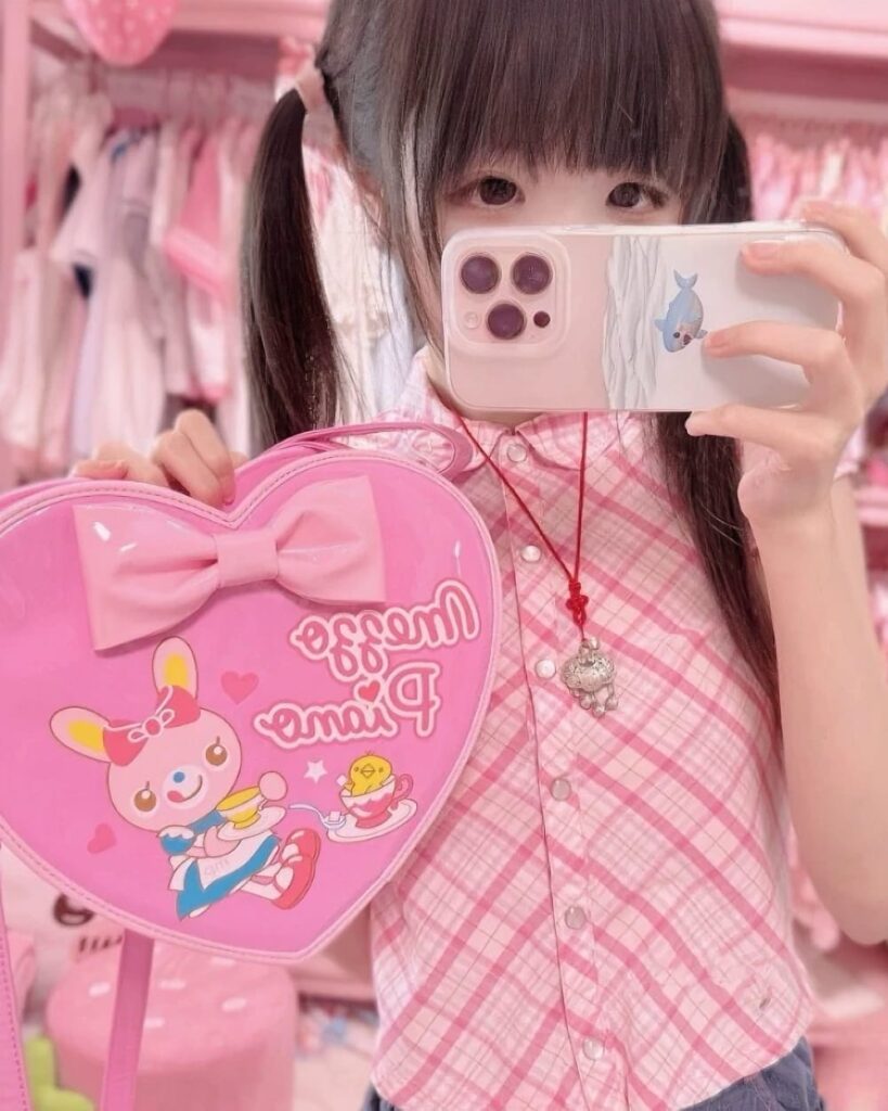 Jojifuku Heart Shaped Cross Body Bag, pink, with character design.