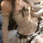 Ruffled Brows Skirt and Top - Coquette aesthetic outfit, featuring a corset top and plaid skirt.