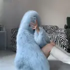 Light blue Thick Fluffy Faux Fur Coat, featuring a hood and plush texture.
