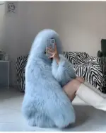Light blue Thick Fluffy Faux Fur Coat, featuring a hood and plush texture.