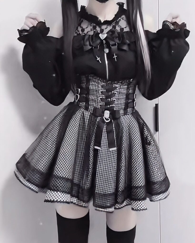 Black Jirai Kei Clothing Set: A layered top and skirt with lace, ruffles, and a plaid skirt.