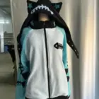 Blue and black Fish Bone Hoodie with fish bone and star details, Harajuku aesthetic.