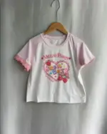 Mezzo Piano Shirt featuring a pink strawberry design, cute floral accents and a relaxed fit.