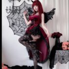 Model wearing a Dark Nun Dress, a romantic goth aesthetic dress with velvet and lace details.
