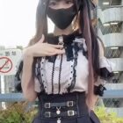 Model wearing a Jirai Kei Skirt with ruffles and a corset.