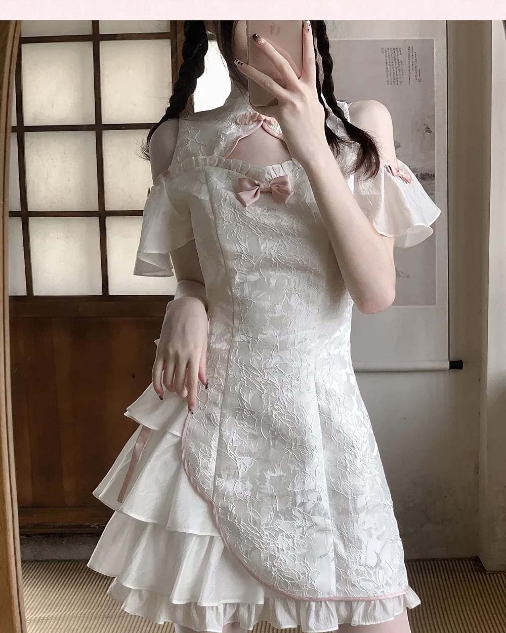 White lace Qi Lolita Dress with ruffled hem and off-the-shoulder sleeves.