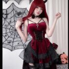 Woman wearing a dark maroon velvet Dark Nun Dress with lace details and a corset, gothic style.