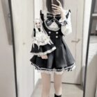 Model wearing a Jirai Kei Dress Collection, complete with doll and accessories.