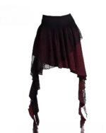 Irregular Grunge Plaid Skirt featuring patchwork and layered fabric details.