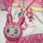 Mezzo Piano Cross Body Bag featuring a plush bunny character and musical print design.