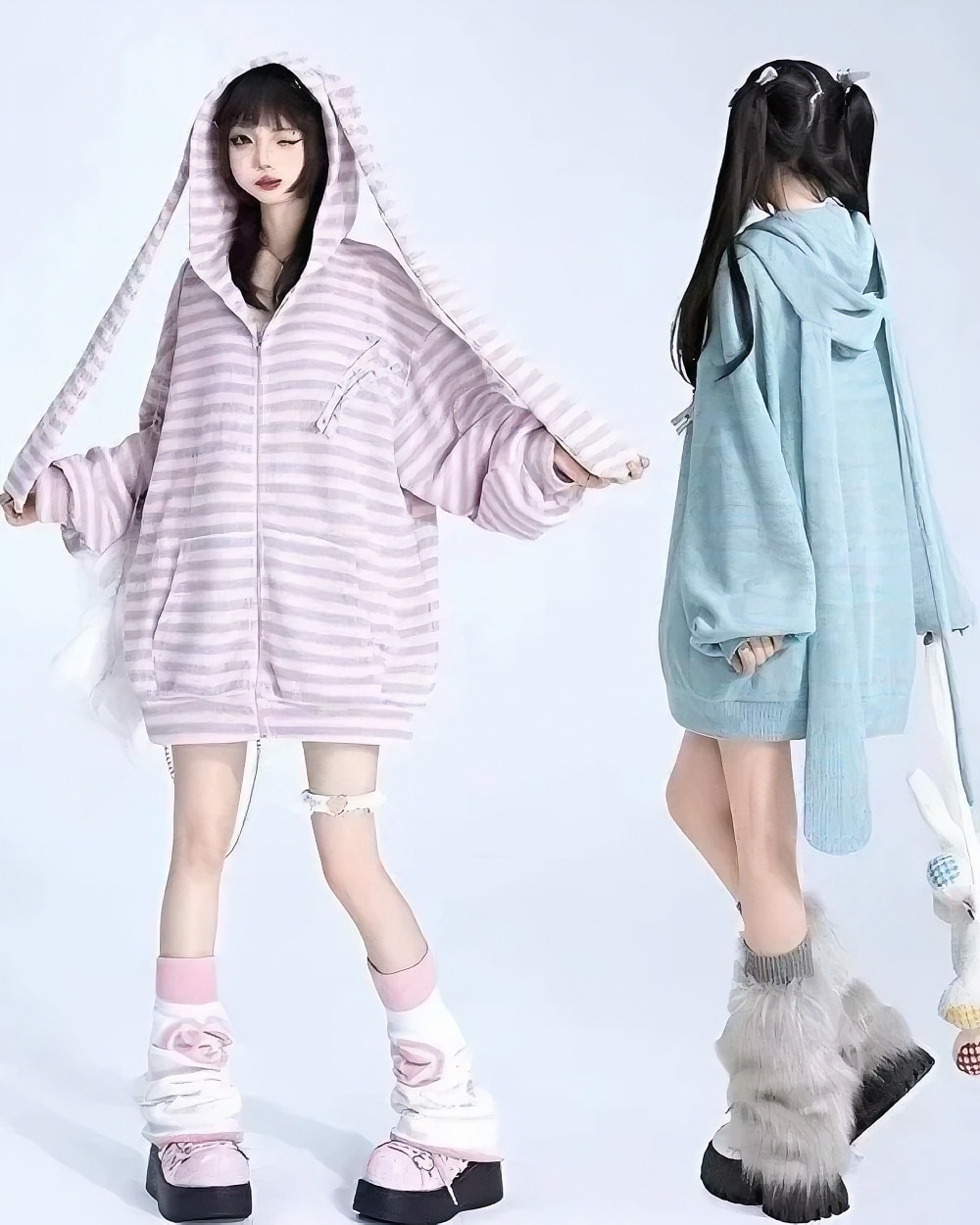 Two models wearing Long Eared Bunny Hoodie with striped zip-up jackets and matching accessories.