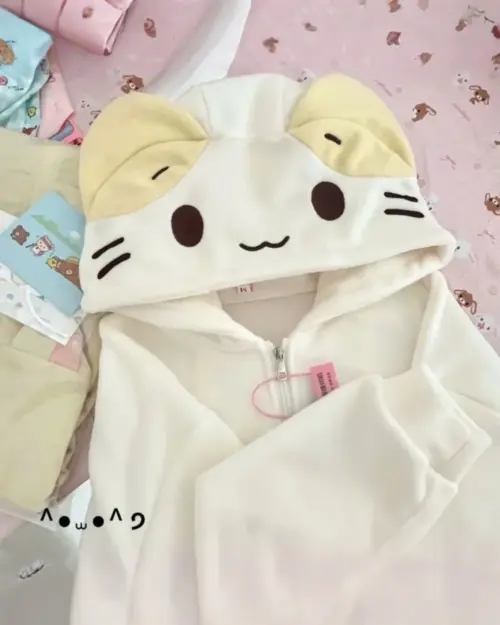 Cream Neko Hoodie - Jojifuku Aesthetic, close-up view of a white hooded sweatshirt with cat ears and face design.
