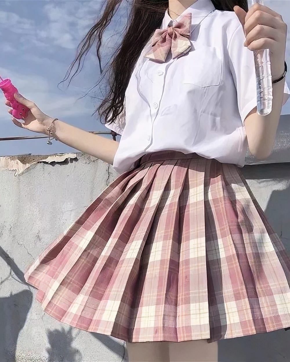 Pink and beige JK Plaid Skirt with pleats, part of the Summer Plaid Skirt Collection.