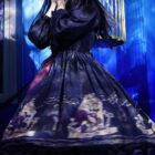 Close-up of a Gothic Lolita Dress - Dolly Kei featuring a dark floral and ship print design.
