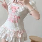 White Ruffled Cake Skirt - Yume Kawaii Skirt with pink accents and character print.
