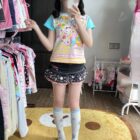Mezzo Piano Print Top - Jojifuku Aesthetic, featuring a girl wearing a pastel print top, skirt, socks, and accessories.