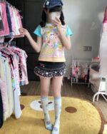 Mezzo Piano Print Top - Jojifuku Aesthetic, featuring a girl wearing a pastel print top, skirt, socks, and accessories.