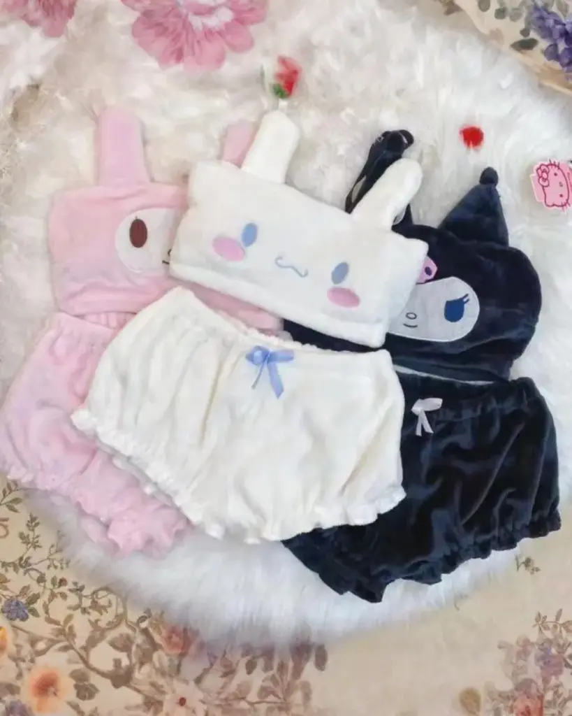 Sanrio-inspired pajamas featuring My Melody and Kuromi, a white and black set.