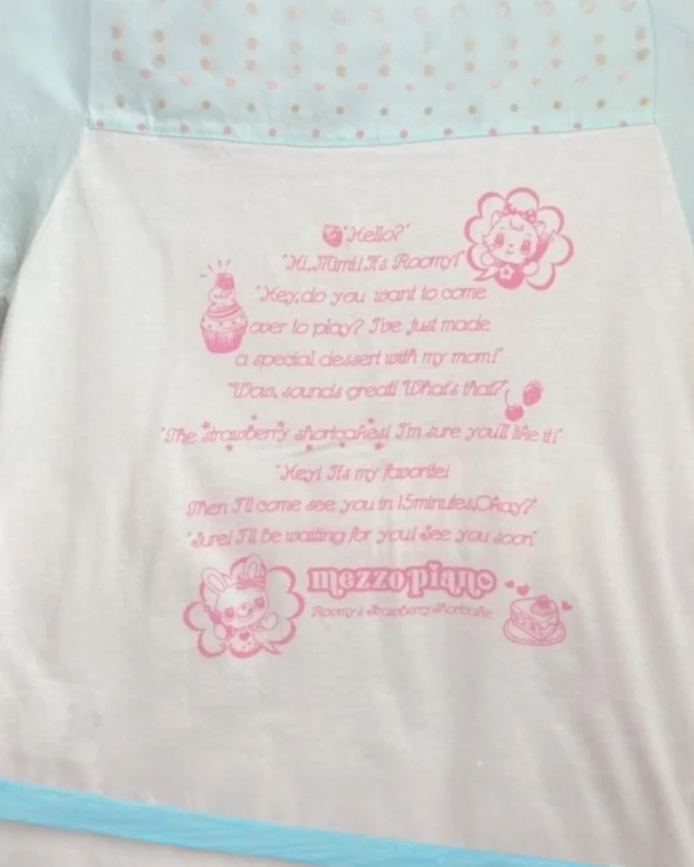 Mezzo Piano Pastel Top featuring a strawberry shortcake illustration and text.