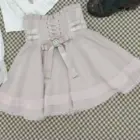 Pink Jirai Kei ruffled skirt with lace trim and bow details. Focus Keyword: Jirai Kei Set