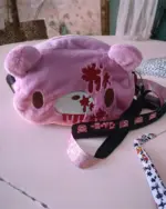 Pink Gloomy Bear Plush Bag with black strap and graphic details.