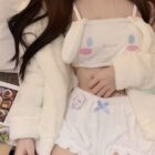 White Sanrio-inspired pajamas set with plush bunny ears and tails.