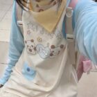 Kawaii Panda Pastel Long Sleeve T-Shirt showing a cute panda design with flowers and stars.