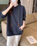 Dark blue Ethno-Chic Hoodie featuring embroidered floral details and a drawstring hood.