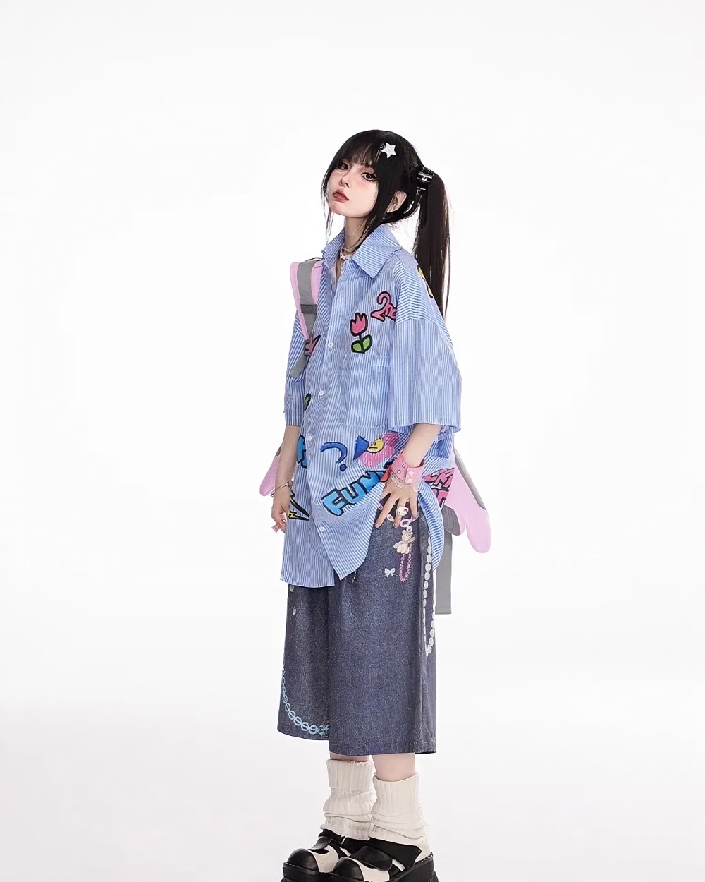 Rainbow Chain Print Bermuda Y2K Aesthetic Pants showing a denim style with embroidered details.