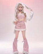 Model wearing The Fluffy Bunny Set - Coquette Aesthetic, featuring a pink skirt, top, and boots.