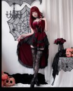 Woman wearing a maroon Dark Nun Dress with lace trim, velvet bodice, and black lace stockings. Romantic goth aesthetic costume.