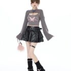 Grunge Fairy Grunge Set: Gray crop top with butterfly print and a black layered skirt, thigh-high socks, and platform shoes.