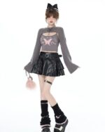 Grunge Fairy Grunge Set: Gray crop top with butterfly print and a black layered skirt, thigh-high socks, and platform shoes.