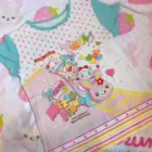 Mezzo Piano Print Top featuring cartoon characters and stars, Jojifuku aesthetic.