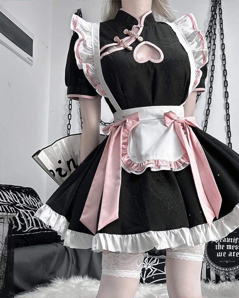 Black and pink Kawaii Maid Dress with frills, bow, and lace trim. Cute cosplay outfit.