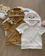 Two Kuma Zip Up Hoodies in brown and white, featuring Rilakkuma faces. Jojifuku Hoodie design.