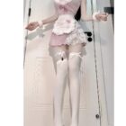 Pink Maid Mini Dress - Dollette Aesthetic, featuring a pink and white lace outfit with a frilly apron and stockings.