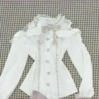 White off-shoulder blouse with ruffles, part of the Jirai Kei Set.