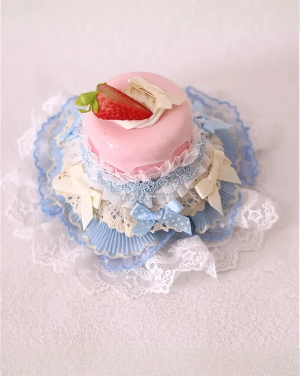 Ruffled Cake Hairpin - Sweet Lolita Hairpin, featuring delicate lace, bows, and a strawberry adornment.