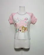 White Sugarbunnies T-Shirt with pink sleeves, featuring cute character illustrations and text.