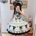 A Frilly Ribbon Dress - Hime Lolita Dress, featuring layers of ruffles and bows, worn by a model.