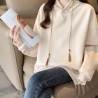 Loose Thickened Pullover Hoodie - Ethno-Chic Hoodie, beige color, with embroidered details and a drawstring.