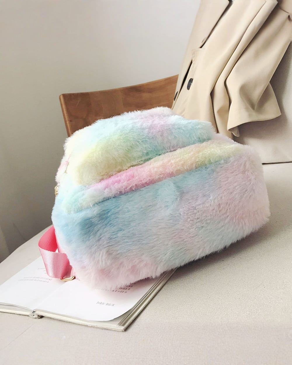 Rainbow-colored Rabbit Ears Plush Backpack, a soft, furry shoulder bag.