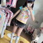 Person wearing a Mezzo Piano Print Top - Jojifuku Aesthetic.